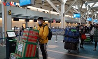 Vietnamese citizens return home from Canada, South Korea