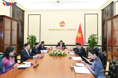 梁强与韩国新任总统李在明通电话 - ảnh 1