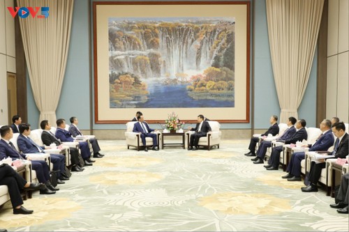   国会副主席陈光方会见四川省委书记、省人大常委会主任王晓晖 - ảnh 1