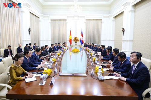 To Lam y Hun Manet tratan sobre orientaciones para fortalecer relaciones Vietnam-Camboya - ảnh 1