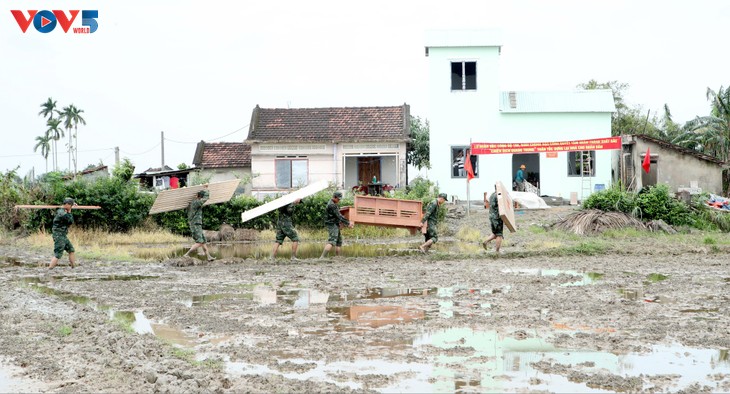 El bienestar se siente en cada hogar vietnamita en el Tet  - ảnh 7