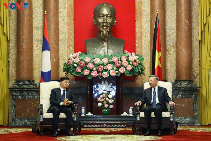 Presiden To Lam Menerima Sekjen, Presiden Laos, Thongloun Sisoulith - ảnh 1