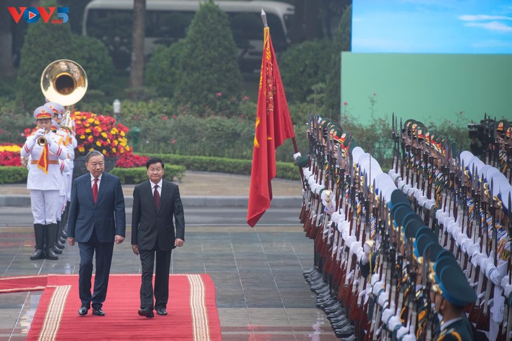General Secretary To Lam hosts welcome ceremony for top Lao leader  - ảnh 1