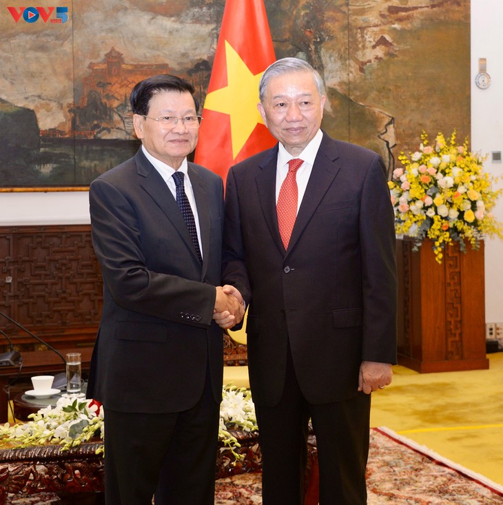 ເລ​ຂາ​ທິ​ການ​ໃຫຍ່ ໂຕ​ເລິມ ພົບ​ປະ​ກັບ​ ​ເລ​ຂາ​ທິ​ການ​ໃຫຍ່, ປະ​ທານ​ປະ​ເທດ ລາວ - ảnh 1