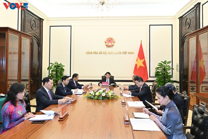 梁强与韩国新任总统李在明通电话 - ảnh 1