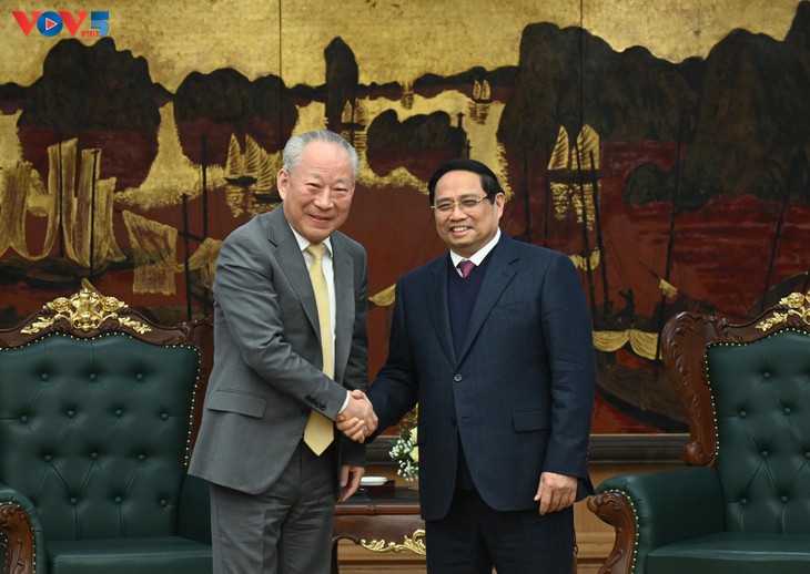 Premierminister Pham Minh Chinh empfängt Gründer der China Pacific Contruction Group  - ảnh 1