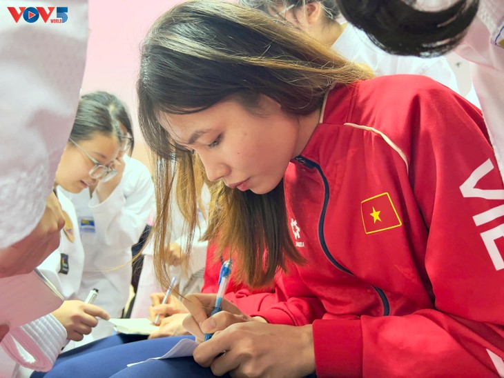 Nhà vô địch SEA Games giao lưu, truyền lửa Taekwondo tại CLB Nghĩa Tân - ảnh 7