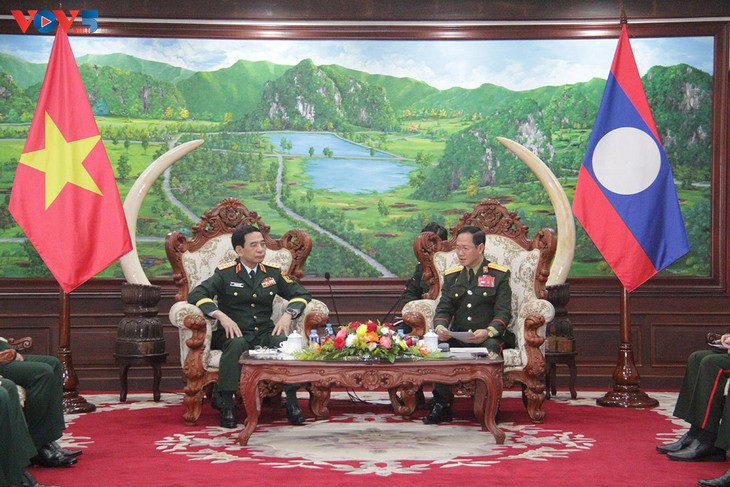 ผลักดันการปฏิบัติแผนความร่วมมือระหว่างกระทรวงกลาโหมเวียดนามกับกระทรวงกลาโหมลาว - ảnh 1