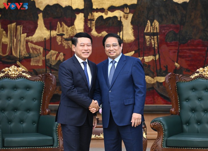 Thủ tướng Phạm Minh Chính tiếp Phó Thủ tướng, Trưởng Ban cải cách doanh nghiệp Lào - ảnh 1