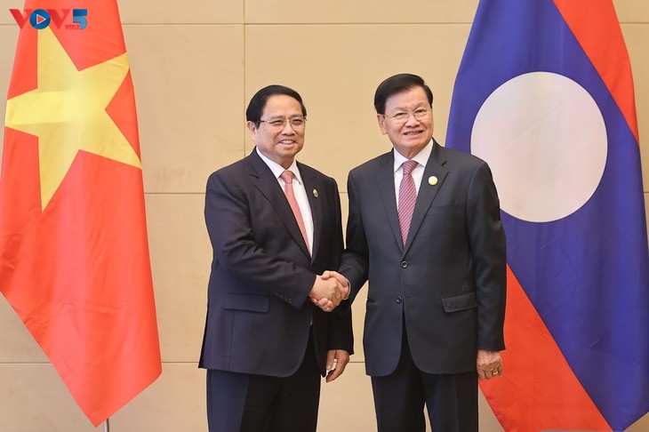 Việt Nam và Lào tiếp tục ủng hộ lẫn nhau tại các diễn đàn đa phương - ảnh 1
