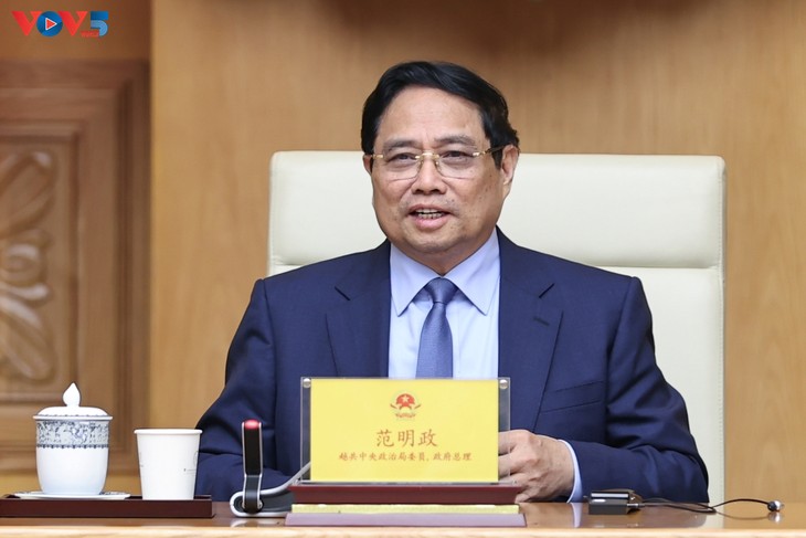 Thủ tướng Phạm Minh Chính tiếp Chủ tịch Khu tự trị dân tộc Choang Quảng Tây, Trung Quốc - ảnh 1