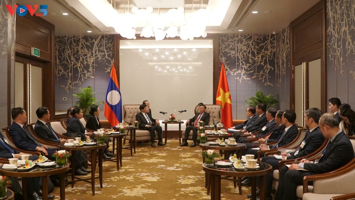 Lễ tiễn Tổng Bí thư, Chủ tịch nước Lào cùng Phu nhân và đoàn đại biểu cấp cao Đảng, Nhà nước Lào - ảnh 1