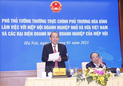 Les meilleurs chefs de PME  reçus par Truong Hoa Binh - ảnh 1