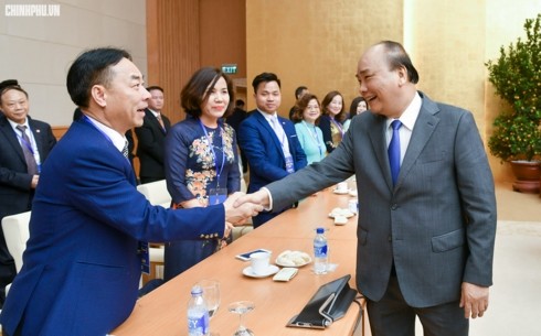 Rencontre du Premier ministre avec des Vietkieu - ảnh 1