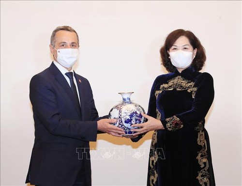 Feier zum schweizerischen Nationalfeiertag und 50 Jahre der Beziehungen zwischen Vietnam und der Schweiz - ảnh 1