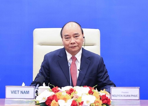 Staatspräsident Nguyen Xuan Phuc begrüßt die olympischen Spiele in Peking - ảnh 1