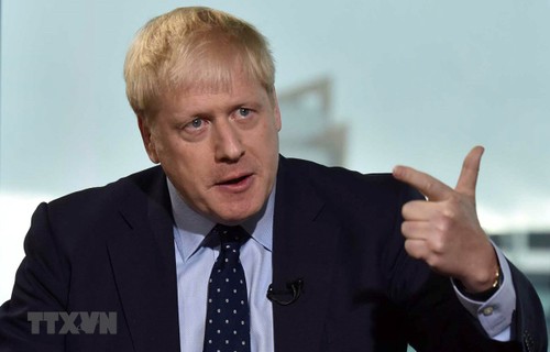 Британский премьер призвал ЕС отреагировать на его предложения по Brexit - ảnh 1