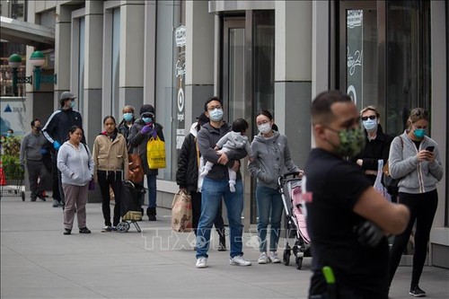 Pimpinan AS dan Inggris menyepakati arti pentingnya dari koordinasi dalam menghadapi wabah Covid-19 - ảnh 1