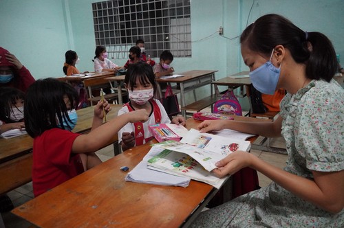 Free classes for disadvantaged children in HCM city - ảnh 1