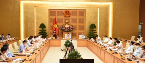 Premierminister leitet Treffen zwischen den ständigen Regierungsmitgliedern und der Abteilung für Öffentlichkeitsarbeit - ảnh 1