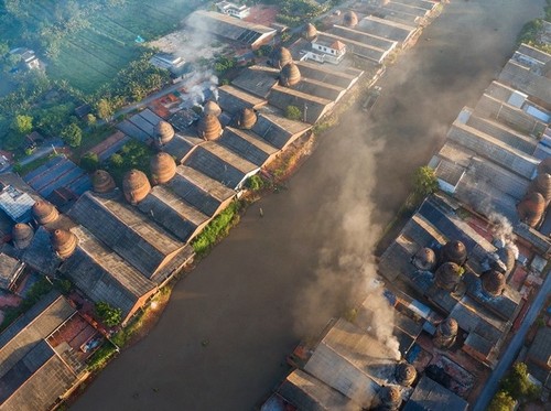 Das Dorf für die Herstellung von Keramikziegeln Mang Thit - ảnh 3