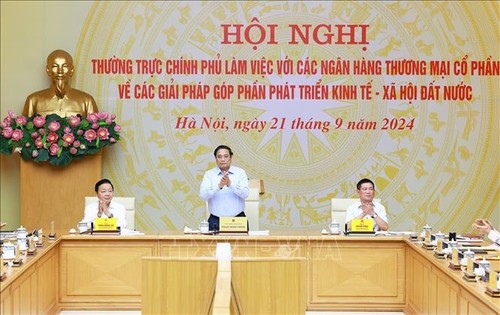 Premierminister Pham Minh Chinh tagt mit Handelsbanken - ảnh 1