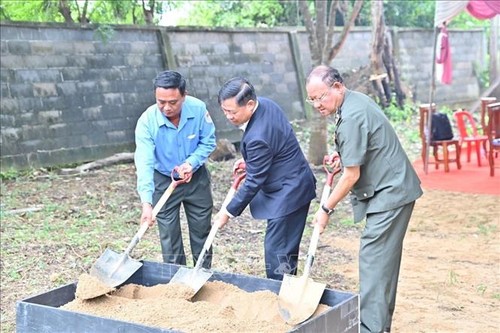 ពិធីបើកការដ្ឋានសាងសង់ផ្ទះរក្សាអដ្ឋិធាតុយុទ្ធជនស្ម័គ្រចិត្តវៀតណាម - ảnh 1