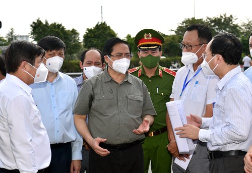 Mencengkam Pedoman Besar “Jelas, Tegas, Mantap, Berhasil guna” dalam Pencegahan dan Penanggulangan COVID-19 - ảnh 1