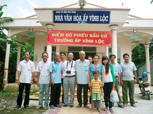 Kaum tani menyumbangkan tanah untuk berpadu tenaga membangun pedesaan baru - ảnh 2