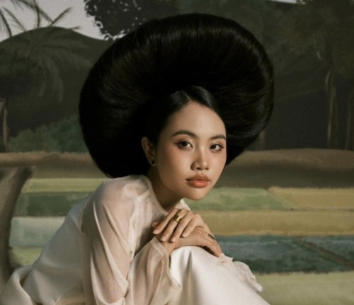 人気ある歌声女性歌手フオン・ミ・チー - ảnh 1