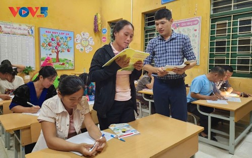 With pens over hoes, a remote village in Dien Bien pursues literacy  - ảnh 1