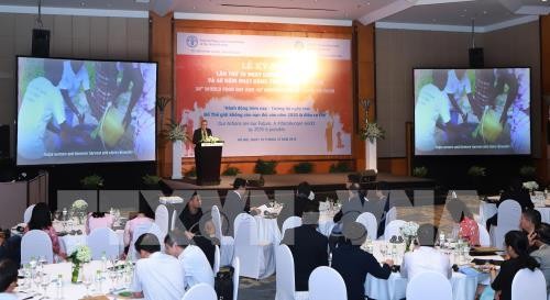 Célébration de la 38e Journée mondiale de l’alimentation et des 40 ans de la FAO au Vietnam  - ảnh 1