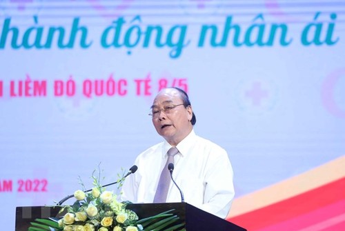 Nguyên Xuân Phuc: le bénévolat et l’action humanitaire sont une responsabilité commune - ảnh 1