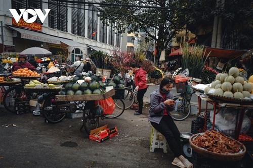 Hà Nội ngày giáp Tết hối hả mà trầm tư - ảnh 6