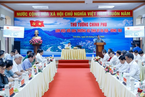 范明政：将昆仑岛打造成为具有国际水平的明亮、绿色、清洁、美丽、现代化地区 - ảnh 1