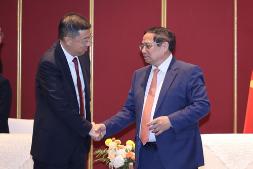 范明政建议中国顶级银行参与越南国际金融中心建设 - ảnh 1