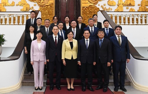 裴青山会见中国广东省副省长张国智 - ảnh 2