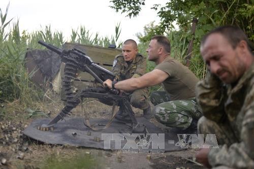 Gewalt-Eskalation in Ostukraine vor dem “Normandie-Format” in Paris - ảnh 1