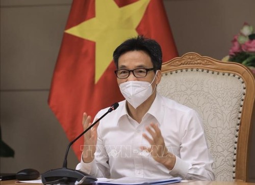 Experten und Wissenschaftler schlagen Maßnahmen zum sicheren Leben mit Covid-19 vor - ảnh 1