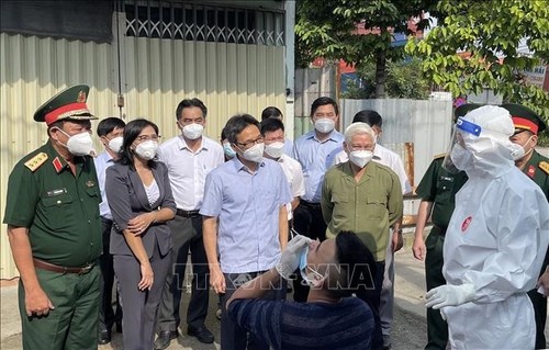 Vizepremierminister Vu Duc Dam tagt mit der Provinz Binh Duong über Covid-19-Bekämpfung - ảnh 1