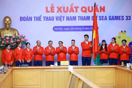 Le Thanh Thuy und Le Minh Thuan sind Fahnenträger für die vietnamesische Sportdelegation bei SEA Games 33 - ảnh 1