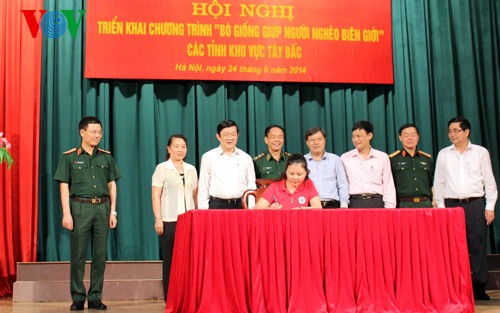 Staatspräsident Truong Tan Sang: Das Leben der Bewohner an der Grenze soll verbessert werden - ảnh 1