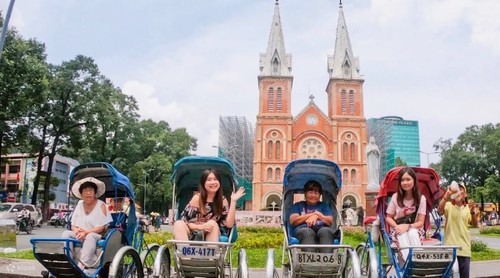Ho-Chi-Minh-Stadt mit der Rikscha entdecken - ảnh 2