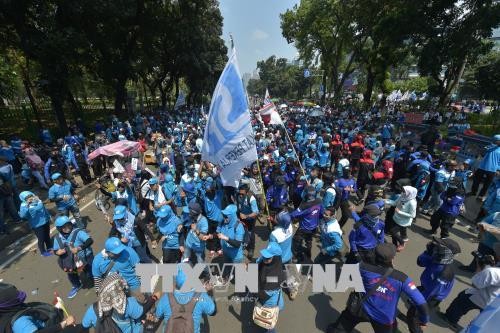 Peringatan Hari Buruh 1/5: Banyak aktivitas dan peristiwa diadakan di dunia - ảnh 1