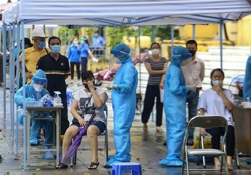 Vietnam records 8,776 cases of COVID-19 in 24 hours - ảnh 1