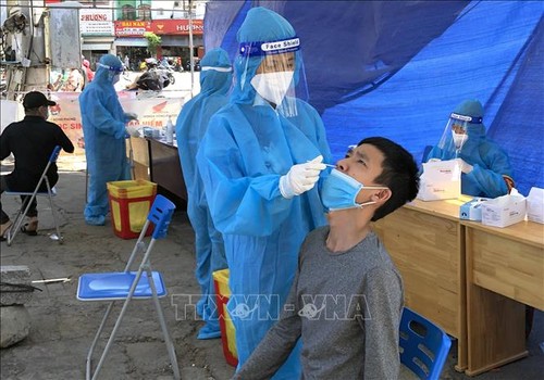 COVID-19: Vietnam records 10,583 more cases, Hanoi to ease restrictions  - ảnh 1