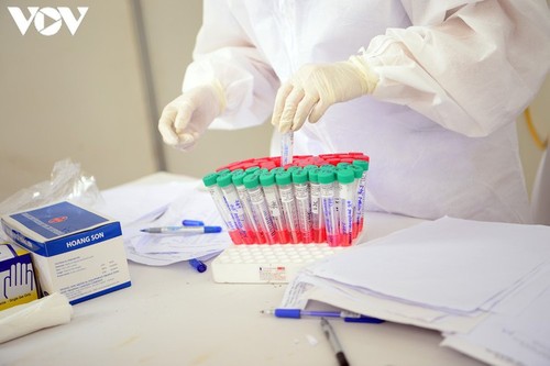 Hanoi continues to conduct RT-PCR tests for returnees from Da Nang - ảnh 12