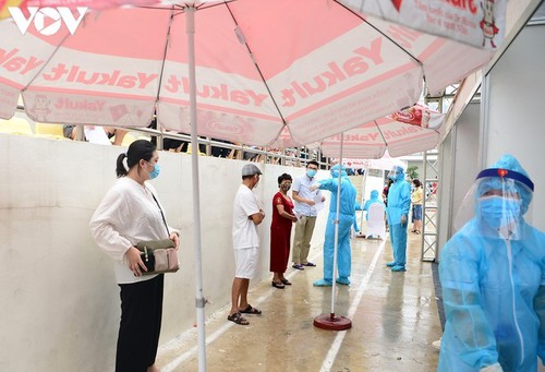 Hanoi continues to conduct RT-PCR tests for returnees from Da Nang - ảnh 7