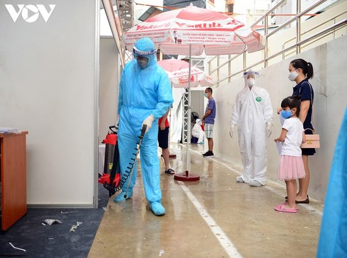 Hanoi continues to conduct RT-PCR tests for returnees from Da Nang - ảnh 8