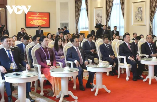 Chủ tịch nước Lương Cường gặp gỡ cộng đồng người Việt Nam tại Trung Quốc - ảnh 3